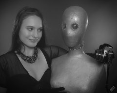 2019-09-21 Kristine Gold - in tightly-laced black underbust corset worn over black Miraclesuit strapless one-piece bodyshaper