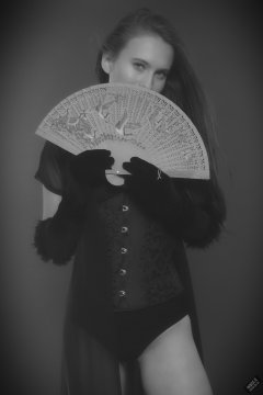 2019-09-21 Kristine Gold - in tightly-laced black underbust corset worn over black Miraclesuit strapless one-piece bodyshaper