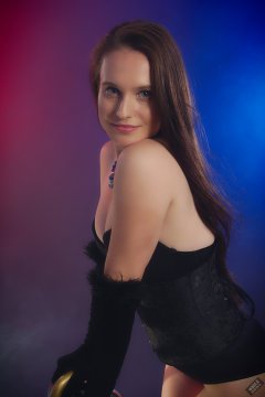 2019-09-21 Kristine Gold - in tightly-laced black underbust corset worn over black Miraclesuit strapless one-piece bodyshaper