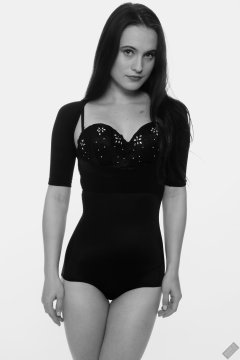 2019-12-14 Kristine Gold in retro-style black posture top and high waist control briefs performing her posing repertoire