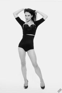 2019-12-14 Kristine Gold in retro-style black posture top and high waist control briefs performing her posing repertoire