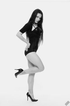 2019-12-14 Kristine Gold in retro-style black posture top and high waist control briefs performing her posing repertoire