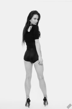 2019-12-14 Kristine Gold in retro-style black posture top and high waist control briefs performing her posing repertoire