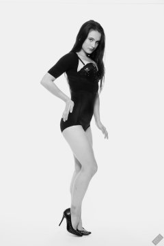 2019-12-14 Kristine Gold in retro-style black posture top and high waist control briefs performing her posing repertoire