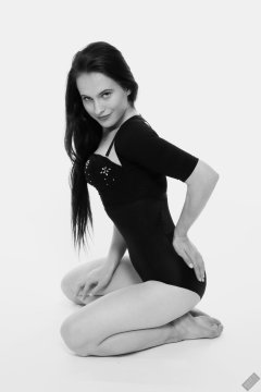 2019-12-14 Kristine Gold in retro-style black posture top and high waist control briefs performing her posing repertoire