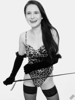 2019-12-14 Kristine Gold models her own high-leg animal print one-piece swimsuit