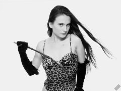 2019-12-14 Kristine Gold models her own high-leg animal print one-piece swimsuit