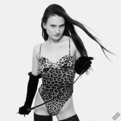 2019-12-14 Kristine Gold models her own high-leg animal print one-piece swimsuit