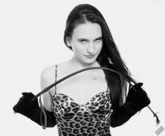 2019-12-14 Kristine Gold models her own high-leg animal print one-piece swimsuit