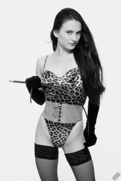 2019-12-14 Kristine Gold models her own high-leg animal print one-piece swimsuit