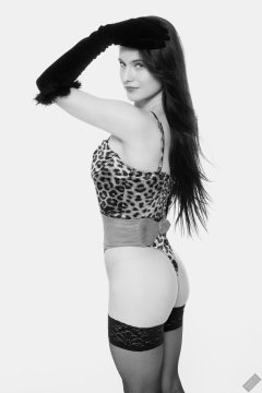 2019-12-14 Kristine Gold models her own high-leg animal print one-piece swimsuit