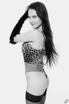 2019-12-14 Kristine Gold models her own high-leg animal print one-piece swimsuit