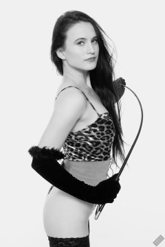 2019-12-14 Kristine Gold models her own high-leg animal print one-piece swimsuit