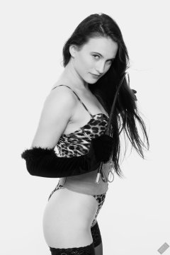 2019-12-14 Kristine Gold models her own high-leg animal print one-piece swimsuit