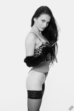 2019-12-14 Kristine Gold models her own high-leg animal print one-piece swimsuit