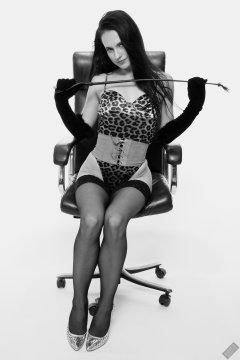 2019-12-14 Kristine Gold models her own high-leg animal print one-piece swimsuit