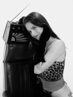 2019-12-14 Kristine Gold models her own high-leg animal print one-piece swimsuit