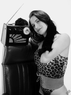 2019-12-14 Kristine Gold models her own high-leg animal print one-piece swimsuit