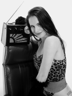 2019-12-14 Kristine Gold models her own high-leg animal print one-piece swimsuit