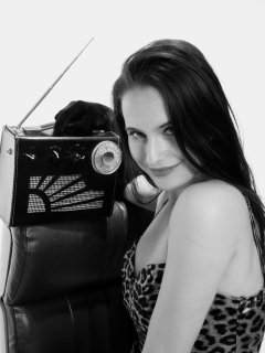 2019-12-14 Kristine Gold models her own high-leg animal print one-piece swimsuit