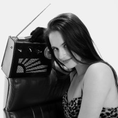 2019-12-14 Kristine Gold models her own high-leg animal print one-piece swimsuit