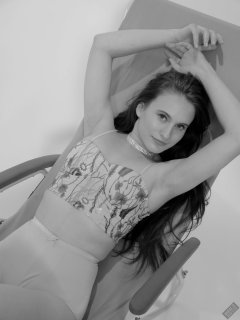 2019-12-14 Kristine Gold in retro beige top and panelled nylon-lycra pantie girdle relaxing on vintage British-made Relaxator 365 reclining chair relaxing on vintage British-made Relaxator 365 reclining chair.