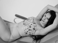 2019-12-14 Kristine Gold in retro beige top and panelled nylon-lycra pantie girdle relaxing on vintage British-made Relaxator 365 reclining chair relaxing on vintage British-made Relaxator 365 reclining chair.