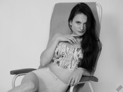 2019-12-14 Kristine Gold in retro beige top and panelled nylon-lycra pantie girdle relaxing on vintage British-made Relaxator 365 reclining chair relaxing on vintage British-made Relaxator 365 reclining chair.