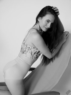 2019-12-14 Kristine Gold in retro beige top and panelled nylon-lycra pantie girdle relaxing on vintage British-made Relaxator 365 reclining chair relaxing on vintage British-made Relaxator 365 reclining chair.