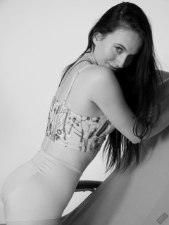 2019-12-14 Kristine Gold in retro beige top and panelled nylon-lycra pantie girdle relaxing on vintage British-made Relaxator 365 reclining chair relaxing on vintage British-made Relaxator 365 reclining chair.