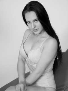 2019-12-14 Kristine Gold in retro beige top and panelled nylon-lycra pantie girdle relaxing on vintage British-made Relaxator 365 reclining chair relaxing on vintage British-made Relaxator 365 reclining chair.