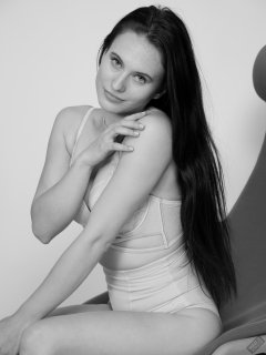 2019-12-14 Kristine Gold in retro beige top and panelled nylon-lycra pantie girdle relaxing on vintage British-made Relaxator 365 reclining chair relaxing on vintage British-made Relaxator 365 reclining chair.