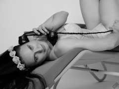 2019-12-14 Kristine Gold in retro beige top and panelled nylon-lycra pantie girdle relaxing on vintage British-made Relaxator 365 reclining chair relaxing on vintage British-made Relaxator 365 reclining chair.