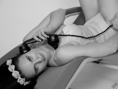 2019-12-14 Kristine Gold in retro beige top and panelled nylon-lycra pantie girdle relaxing on vintage British-made Relaxator 365 reclining chair relaxing on vintage British-made Relaxator 365 reclining chair.