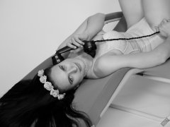 2019-12-14 Kristine Gold in retro beige top and panelled nylon-lycra pantie girdle relaxing on vintage British-made Relaxator 365 reclining chair relaxing on vintage British-made Relaxator 365 reclining chair.