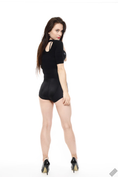 2019-12-14 Kristine Gold in retro-style black posture top and high waist control briefs performing her posing repertoire