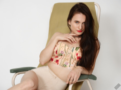 2019-12-14 Kristine Gold in retro beige top and panelled nylon-lycra pantie girdle relaxing on vintage British-made Relaxator 365 reclining chair relaxing on vintage British-made Relaxator 365 reclining chair.