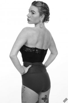 2020-01-18 Danni Moss in black strapless bra-top and purple high-waisted control-briefs
