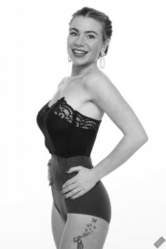 2020-01-18 Danni Moss in black strapless bra-top and purple high-waisted control-briefs