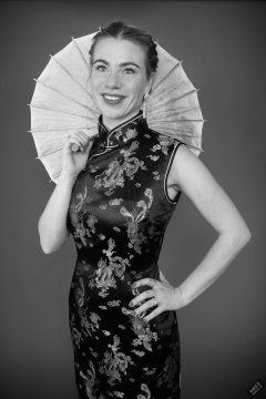 2020-01-18 Danni Moss in black full-length silk cheongsam dress