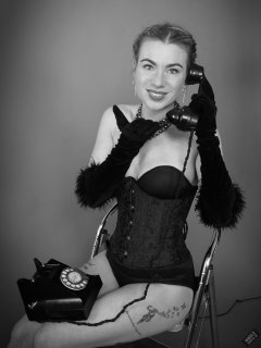 2020-01-18 Danni Moss in black one-piece Miraclesuit bodyshaper and tightly-laced underbust corset
