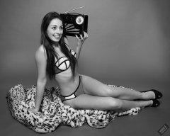 2020-02-02 Jessica Maria listens to vintage Radio Exchange Roamer Ten reciever. Jessica wears blue neoprene bikini