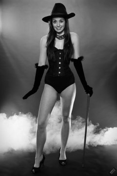 2020-02-02 Jessica Maria in tightly-laced black underbust corset, worn over black Miraclesuit bodyshaper