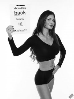 2020-03-08 LisaAnne in black crop top and vintage style black pantie girdle worn as hot pants