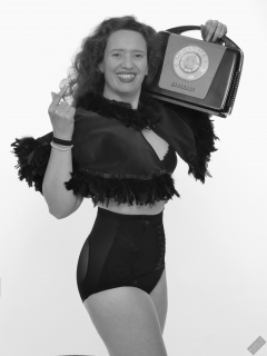 Chiara models tight, vintage-style, high-waisted, hook-front girdle for her 21st anniversary shoot