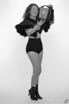 Chiara models tight, vintage-style, high-waisted, hook-front girdle for her 21st anniversary shoot