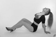 Rebecca Love - fitness set, in black posture top, red bra and lycra control briefs, worn as hotpants