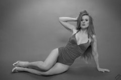 Rebecca Love - models tight purple vintage style one-piece swimsuit