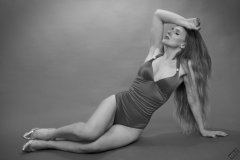Rebecca Love - models tight purple vintage style one-piece swimsuit