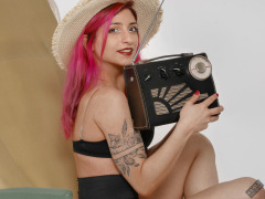 2022-07-02 Mave D models black bra top and vintage girdle worn as hotpants, whilst relaxing in vintage Relaxator 365 chair and listening to Roamer Ten radio
